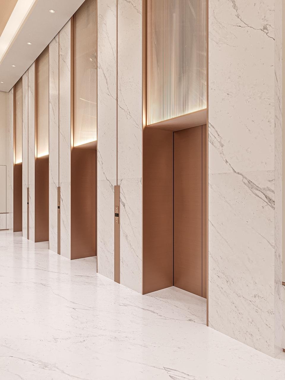 Hall d’entrée et ascenseurs en marbre du projet Cybel by Wadan à Dubai Land Residence Complex