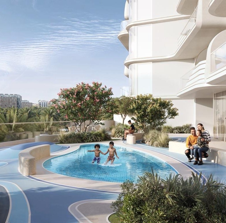 Piscine pour enfants et espace extérieur famille au projet Cybel by Wadan à Dubai Land Residence Complex