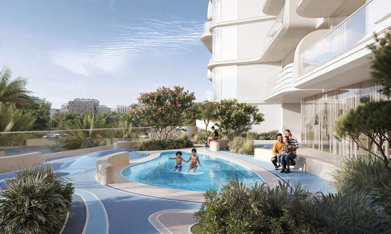 Piscine pour enfants et espace extérieur famille au projet Cybel by Wadan à Dubai Land Residence Complex