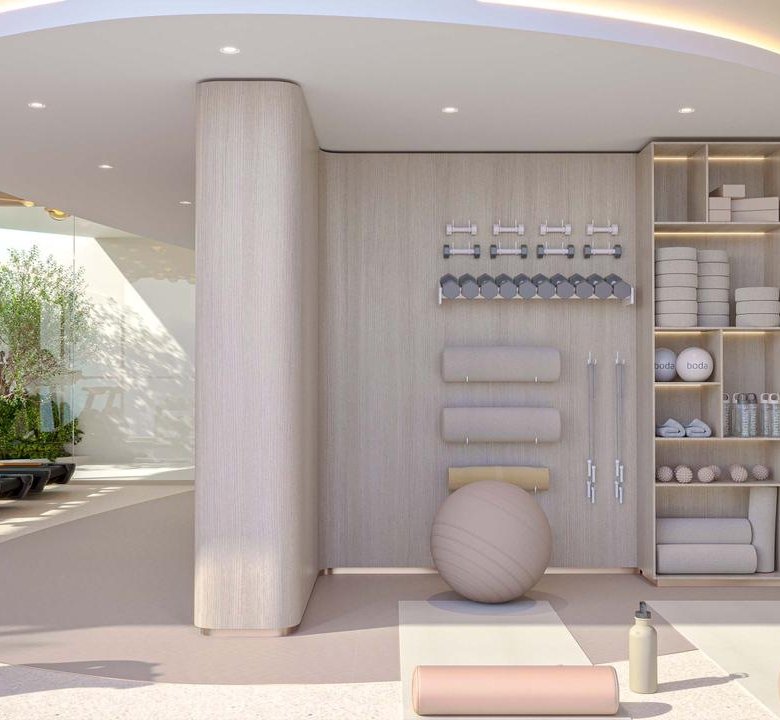 Zone stretching et bien-être dans la salle de sport du projet Cybel by Wadan à Dubai Land Residence Complex