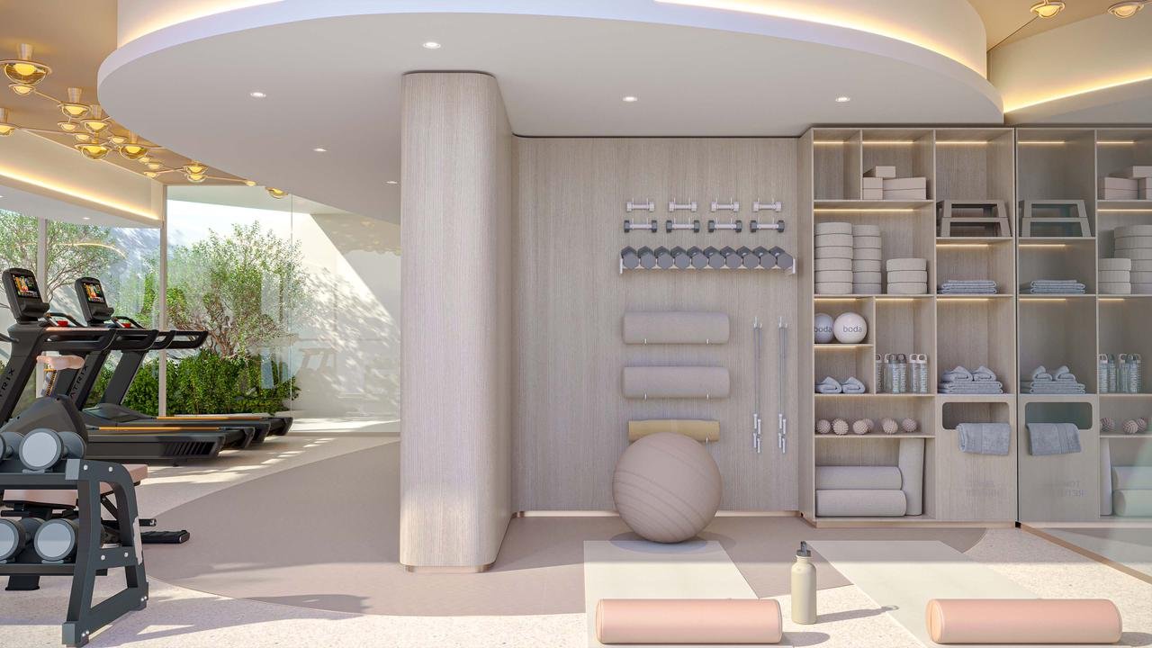 Zone stretching et bien-être dans la salle de sport du projet Cybel by Wadan à Dubai Land Residence Complex