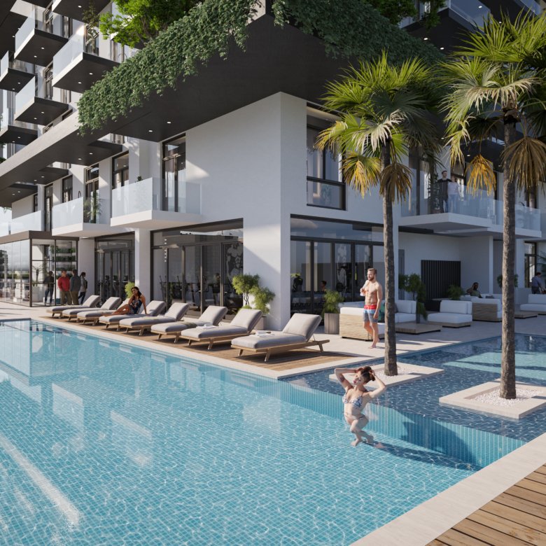 Piscine extérieure moderne du projet Treppan Tower JVT avec transats, palmiers et espaces lounge dans une résidence haut de gamme à Dubaï