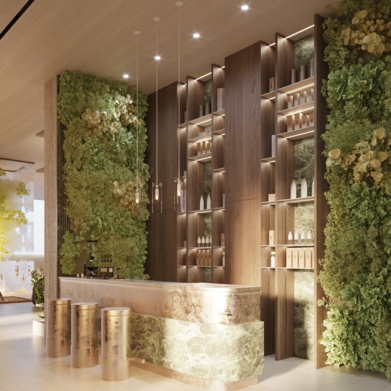 Lobby wellness du Treppan Tower à JVT avec mur végétal, design naturel, espace lounge premium et ambiance bien-être
