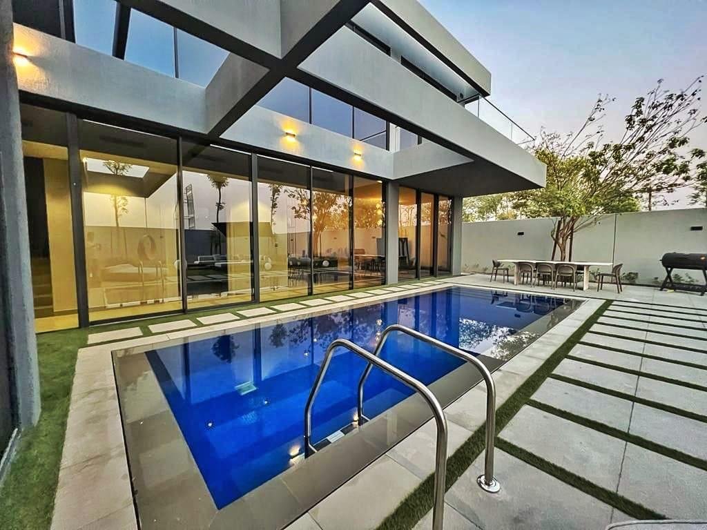 Piscine privée et terrasse dans une villa Masaar 3